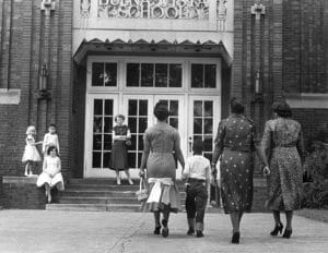 Errol Groves holds the hand of his mother - Photo by Eldred Reaney